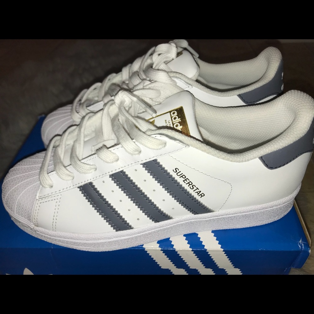 Gray and White Adidas Superstars